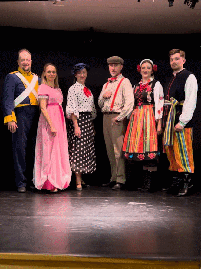 People in real folk costiumes after show in 2026 in House of Literature in Warsaw
